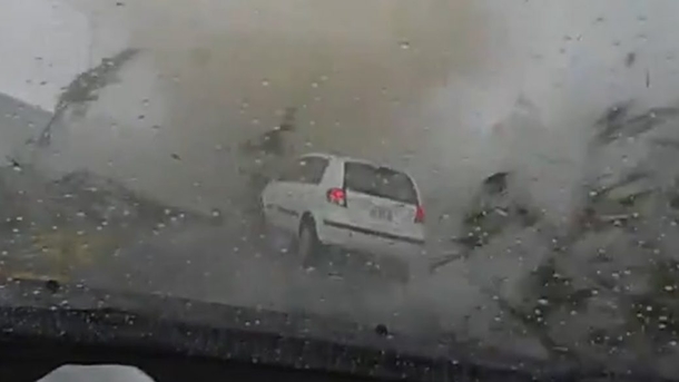Man Who Cuts A Car Off In Traffic Instantly Gets Sucked Up By A Tornado (Video) - picture 2