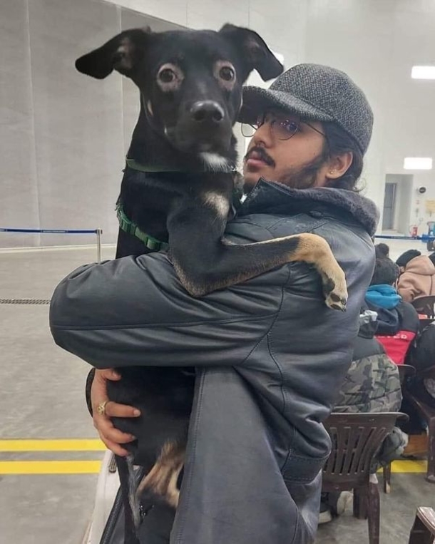 Man who wouldn't leave the country without his rescue dog makes it to safety after plea - picture 2