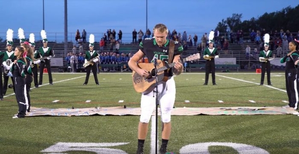 No One Stepped Forward To Sing The National Anthem, So He Removed His Helmet And Picked Up The Guitar - picture 3