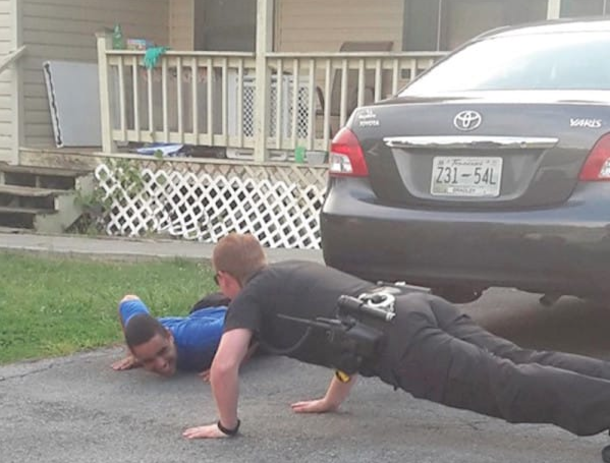 Officer Notices Child With Autism Throwing A Tantrum, Drops To Ground And Does Push Ups To Calm Him - picture 4