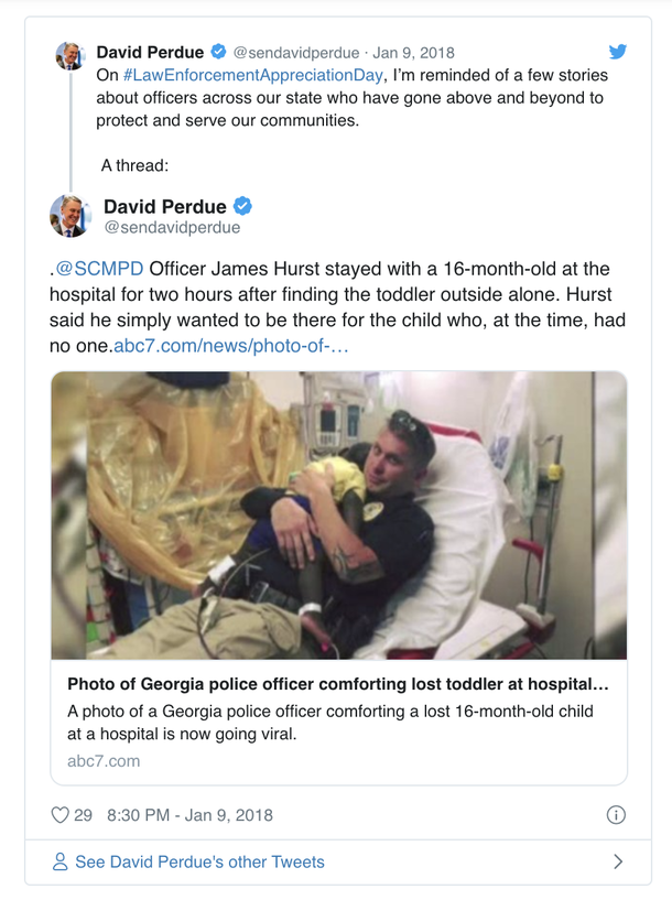 Photo of cop holding abandoned child in hospital bed goes viral immediately - picture 3