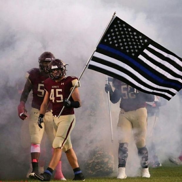 Photo Of Football Player Goes Viral After Cops See What He Did To Our Flag - picture 2