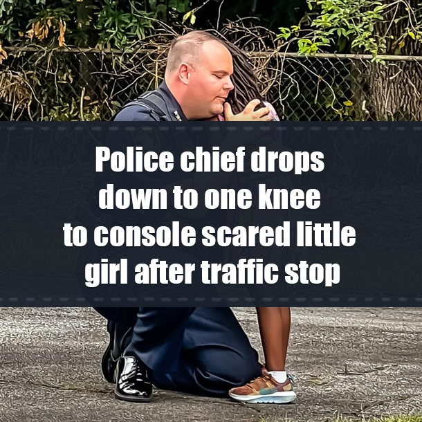 Police chief drops down to one knee to console scared little girl after traffic stop