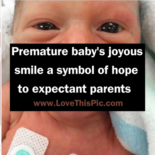 Premature baby's joyous smile a symbol of hope to expectant parents