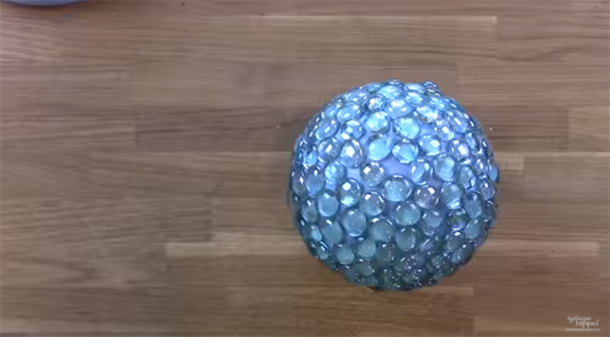 She Glued Marbles To A Foam Ball. What She Makes? WOW! Now She Keeps It Outside And It's Amazing! - picture 5