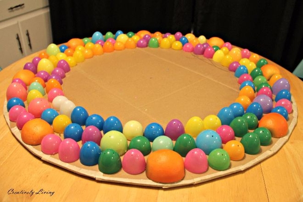 She Hot Glues Some Plastic Eggs To A Piece Of Cardboard. After A Coat Of Paint. WOW! It’s Gorgeous. - picture 2