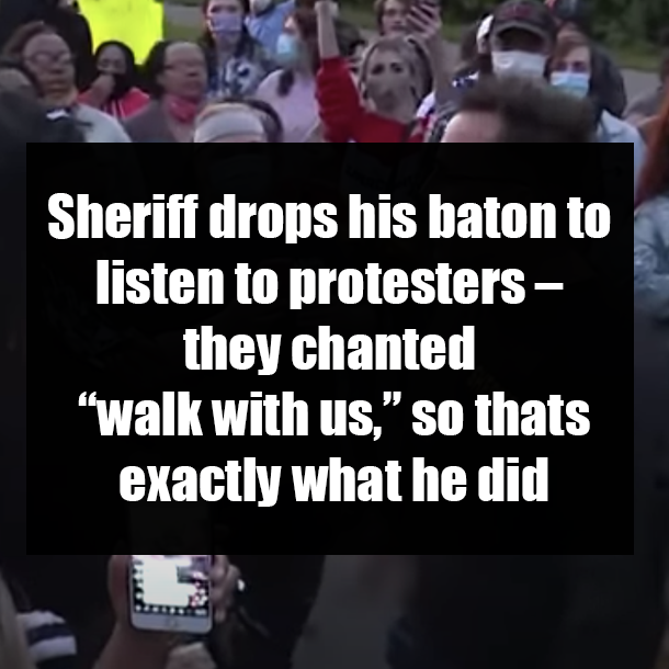 Sheriff drops his baton to listen to protesters – they chanted “walk with us,” so thats exactly what he did