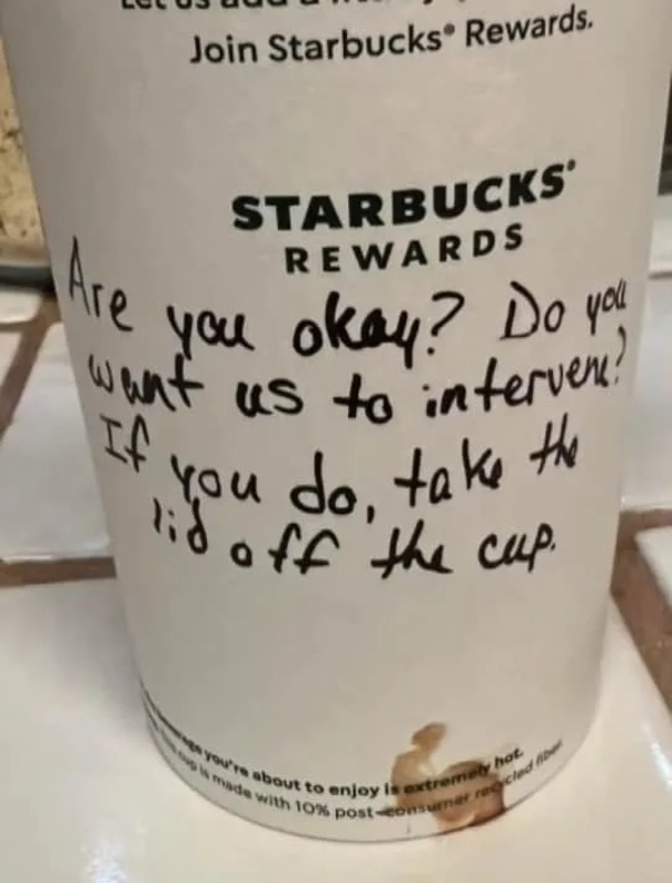 Starbucks employee discreetly helps a teenager in need by passing a note on her coffee cup. - picture 4