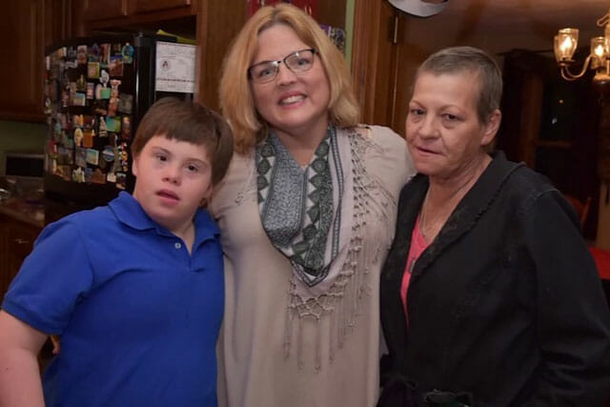 Teacher adopts teenager with Down syndrome after his passed away due to breast cancer - picture 2