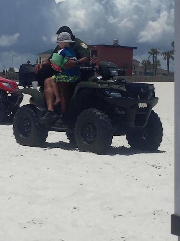 Woman Notices Cop Drenched In Sweat At The Beach, Can't Believe What's On His Back - picture 3