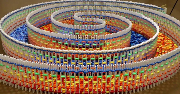 An amazing 15,000 dominoes fall down in hypnotizing fashion in triple ...
