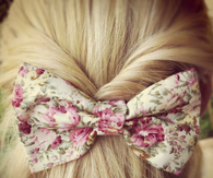 Floral bow with blonde hair