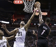 Chris Bosh Blocks Tim Dunncan during Game 5
