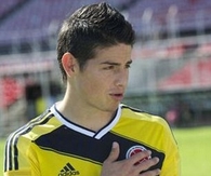  James Rodriguez models the Colombia home shirt