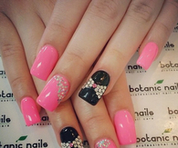 Pink and black rhinestone nails