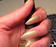 Gold Glitter stiletto nails