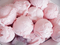 Scoops of strawberry ice cream