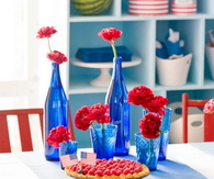 Cobalt Blue Bottles with Red Roses