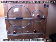 DIY Towel Racks into Cabinets