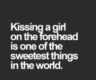 Kissing a girl on the forehead