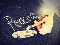 Girl writing peace