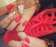 Red stiletto rhinestone nails