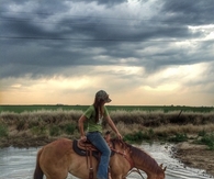 A country girl and her horse