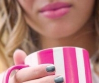 Pink and white striped coffee cup
