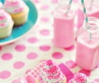Pink sprinkles on cupcakes
