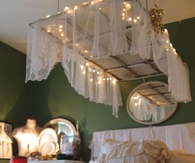 Old Window as a Canopy Above Bed