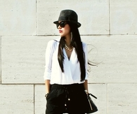 Black & White Skorts Outfit with Strappy Ankle Wrap Sandals and Funky Hat