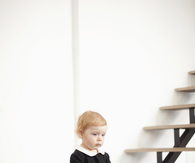 Baby Girl in Old Fashion Black Dress with White Collar
