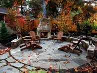 Round Flagstone Patio with Stone Fireplace