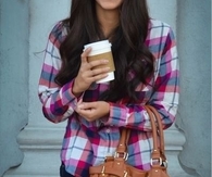 Leather purse and hot coffee
