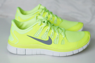 Neon green nike jogging shoes