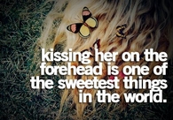 kissing her on the forehead