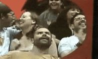 Couple kissing spills beer