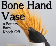Bone hand vase