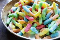 Bowl of sour gummy worms