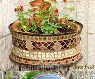 How To Turn An Old Wheel Into A Garden Planter 
