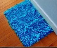 Turn Your Old Shirts Into A Floor Mat 