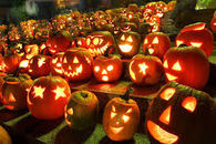 Lit Pumpkins at Night