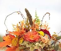 Bucket filled with Leaves and Fall Flowers