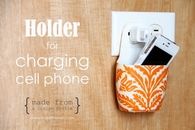 Holder for charging cell phone