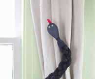 Snake curtain tiebacks