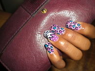 Purple and violet animal print nails