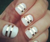 Gold striped white nails