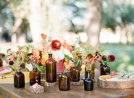 Floral bottle wedding decor