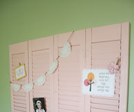 Repurposed shutter wall display