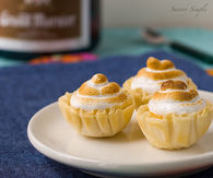 Orange meringue tarts with grand marnier